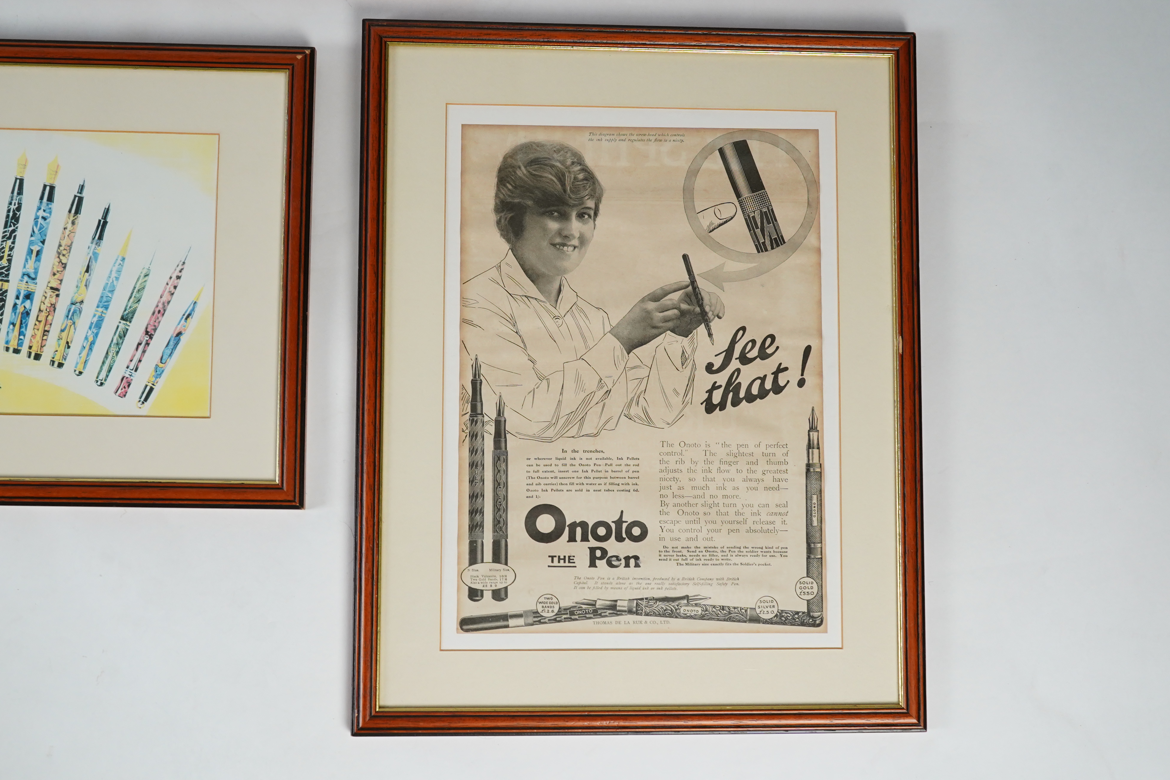 Framed fountain pen adverts (12)